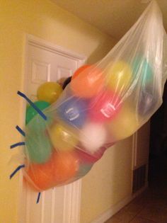 a plastic bag filled with lots of balloons