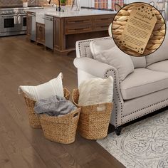 a living room filled with furniture next to a kitchen and breakfast nook area on top of a hard wood floor