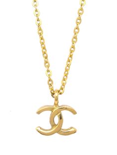 circa 1982 gold plated polished finish delicate chain signature interlocking CC logo logo charm spring-ring fastening Condition: GOOD. This previously owned and used item is in good condition with minimal signs of use. This may include fading of material or plating and scratches. Purchasing this item continues its narrative and reduces the environmental impact by avoiding the use of new resources needed to make the product from scratch, such as water, materials and electricity, and avoiding additional manufacturing impact. Learn more about what makes a product Conscious on our Conscious Criteria page Expensive Necklaces Luxury, Gold-tone Plated Jewelry With Logo Plaque, Metal Pendant Jewelry With Gold-tone Logo Plaque, Gold Metal Necklaces With Gold-tone Logo Plaque, Gold Chain Necklace With Gold-tone Logo, Gold Chain Necklace With Logo Plaque, Classic Gold Necklace With Logo Charm, Gold Metal Necklace With Logo Charm, Gold Necklace With Logo Charm