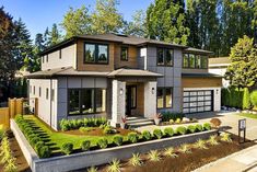 a house with landscaping in the front yard