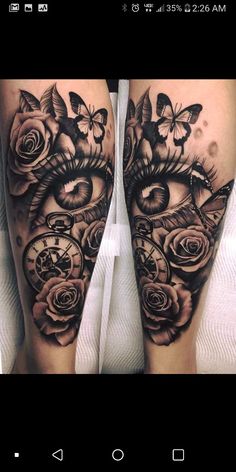 a woman's leg with roses and clocks on it