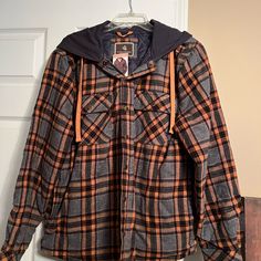 Legendary Outfitters. Men Size Medium And Nwt. Color Is A Dark Gray With Orange Stripes. Plaid Flannel Outerwear For Outdoor, Plaid Long Sleeve Outerwear For Outdoor Activities, Plaid Outerwear For Fall Outdoor Activities, Plaid Cotton Outerwear For Outdoor Activities, Flannel Long Sleeve Outerwear For Outdoor, Flannel Outerwear For Fall Outdoor Activities, Casual Winter Flannel Shirt For Outdoor Activities, Long Sleeve Flannel Shirt For Fall Outdoor Activities, Hooded Flannel Outerwear For Fall