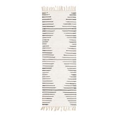 a black and white rug with fringes on the bottom, in front of a white background