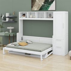 a white bunk bed sitting next to a green wall