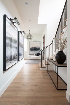 the hallway is clean and ready for us to use as an entrance way in this home