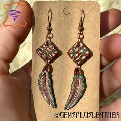 Welcome to GemsPlusLeather, where boho elegance meets artisan craftsmanship! Dive into the world of unique accessories with these Hand-Tooled Leather Boho Style Earrings featuring a captivating turquoise patina and copper accents.  These earrings are a nod to Bohemian chic, reflecting a carefree and artistic spirit. They are perfect for adding a touch of uniqueness to your daily attire or complementing your Boho-inspired outfits on special occasions. Don't miss the opportunity to own a piece of Copper Furniture, Leather Creations, Boho Furniture, Boho Style Earrings, Copper Accents, Mode Boho, Hand Painted Leather, Hand Tooled Leather, Painting Leather