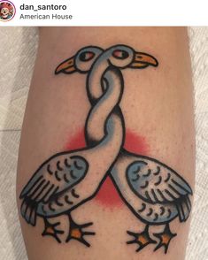 two birds with chains on their legs are shown in this tattoo style photo taken from above