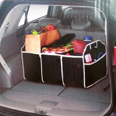 the back end of a car filled with luggage