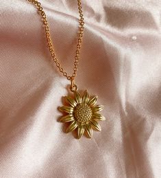 "Our favorite, this cute Sunflower charm Necklace in gold! 🌻 Hand made by Holly from Tumbled Shop with a gold tone pendant of a yellow sunflower and hung on a 14K gold plated chain 18\" long.  We are honored you are here! Thank you for supporting our small business and unique healing creations. Orders over $50 get free shipping in the US & a Free TumbledShop sticker! 🔮To stay updated with new items follow us on Instagram @Tumbledshop OR Click the link below! 🌻 https://www.instagram.com/tumbledshop/ ** Remember to FAVORITE the Tumbled Shop as I add inventory daily! (Click the heart next to our shop name). ❤️" Gold-plated Flower Jewelry In Gold, Gold Plated Flower Shaped Jewelry In Gold, Gold Plated Flower Jewelry In Gold Color, Yellow Gold Jewelry With Sunflower Design As Gift, 14k Gold Filled Flower Necklace, 14k Gold-filled Flower Necklace, Gold Flower Shaped Necklace For Everyday, Gold Birth Flower Pendant Necklace, 14k Gold-filled Birth Flower Jewelry