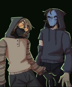 two people in hoodies standing next to each other with one person wearing a mask