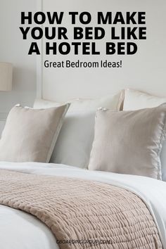 a bed with white sheets and pillows in a bedroom next to a wall sticker that says how to make your bed like a hotel bed