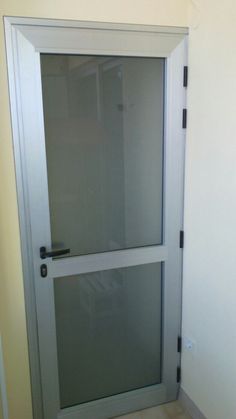 an open door with glass on the inside