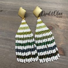 Cedar hand beaded fringe earrings with 18K gold plated studs. Beautiful waves of green on a white background with diamond shaped gold plated stud tops.  These earrings are so cool.  I love all the different greens in different finishes.  With the hint of a Christmas tree, these would be perfect for the holidays, but easy to wear year round! These earrings are handwoven, hand beaded, and intricately designed.  Woven with small Miyuki glass seed beads and strong nylon thread to last a lifetime.   Bead weaving is a time consuming art, each tiny bead is selected and hand sewn one at a time with a needle and thread.  So much love and care goes into each piece.   Woven into the brick stitch is a stainless steel wire to make the earring more stable.  Because bead weaving creates a flexible 'fabri Green Beaded Fringe Earrings For Gift, Christmas Tree Beads, Bee Studs, Beaded Fringe Earrings, Brown Jewelry, Small Christmas Trees, Western Jewelry, Beaded Fringe, Glass Seed Beads