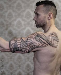 a man with a tattoo on his arm