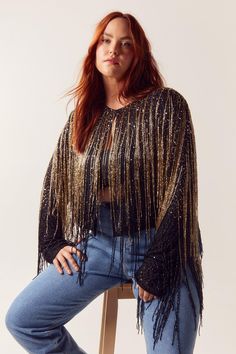 Bead it. Feel glam in our plus size jacket, with sparkling tassel detailing and beads, as well as a relaxed design, and a flirty cropped length. Style it with denim shorts and failsafe boots for a look that will take you from nights out to festival weekends. Plus Size Tassel Beaded Metallic Jacket Comfortable, Relaxed Fit Statement Tassel Design Sparkling Beaded Details Flirty Cropped Length and Open Design Model wears a US size 12-14/UK size 16-18 Christmas Party Shoes, Plus Size Jacket, Tanned Makeup, Metallic Jacket, Velvet Clothes, Sequin Outfit, Christmas Party Outfits, Oasis Fashion, Open Design