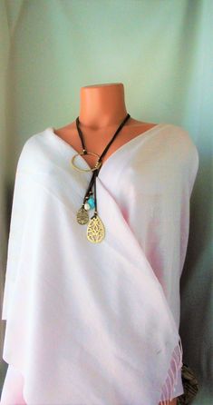 Lovely Leather Lariat necklace. Genuine Turquoises tassel, Unique design NEW vacation Jewelry purchase, never used This is a stunning statement necklace Components include: shiny gold tone quality Brass Genuine 31 inch flat Leather 6 inch Leather Tassel with stone and Brass dangles Handmade in Asia Ready to ship NO waiting Only ONE necklace available Thank you so much for visiting :kaysclassyboutique@etsy.com Vacation Jewelry, Brass Necklace, Necklace Statement, Genuine Turquoise, Leather Tassel, Lariat Necklace, Stone Pendant, Turquoise Stone, Stone Pendants