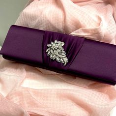 Nina Dressy Clutch. Beautiful Grape Color. Fuchsia Lining. Has Fabric Shoulder Strap Attached. Never Used. Stored In Box In Closet. Pet-Free/Smoke-Free Home. Grape Color, Velvet Clutch, Silver Clutch, Crystal Clutch, Red Sparkle, Color Fuchsia, Blue Back, Evening Purse, Beaded Clutch