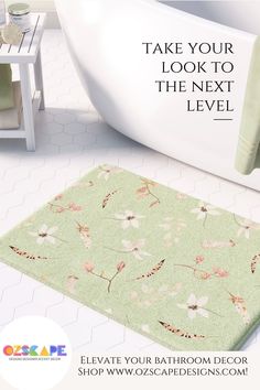 a bathroom rug with flowers on it and the words, take your look to the next level