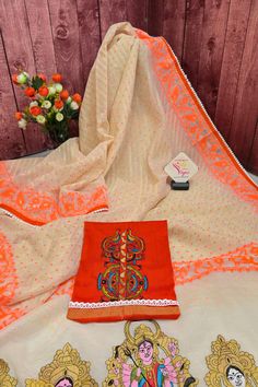 Now get ready with our latest designer jamdani collection with a pallu that comes with a machine-embroidered Durga family with lace work on the border. With all-over self-weaving work, this is a must-buy this puja season. Color: A shade of offwhite and orange color Technique: Comes with lace border and machine embroidered Durga family on the pallu Fabric: Cotton NOTE: Comes with a kalka (paisley) embroidered blouse piece Dhakai Saree, How To Wash Silk, Blouse Measurement, Work Online, Color Techniques, Work Sarees, Lace Border, Embroidery Blouse, Saree Blouse Designs