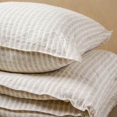 three pillows stacked on top of each other