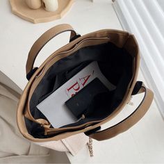 Brand Name: MR.YLLSShape: Casual ToteHandbags Type: Shoulder BagsTypes of bags: Shoulder & HandbagsOrigin: CN(Origin)Main Material: CanvasClosure Type: zipperHardness: SOFTStyle: CasualLining Material: PolyesterOccasion: VersatileGender: WOMENPattern Type: SolidNumber of Handles/Straps: SingleInterior: Cell Phone PocketInterior: Interior Zipper PocketDecoration: ChainsItem Type: Handbags Trendy Canvas Satchel With Mobile Phone Bag, Large Capacity Top Handle Canvas Bag, Trendy Canvas Shoulder Bag With Mobile Phone Pocket, Trendy Canvas Shoulder Bag With Mobile Phone Holder, Trendy Canvas Shoulder Bag With Phone Pocket, Trendy Large Capacity Leather Canvas Bag, Chic Canvas Shoulder Bag With Zipper Closure, Chic Canvas Shoulder Bag With Zipper, Beige Double Handle Bag With Chain Strap