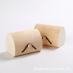 two pieces of wood are sitting next to each other