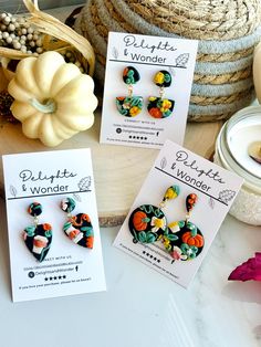 Fall Theme Earrings are so cute for Pumpkin Spice lovers.  Pumpkins, Spice and Coffee Fall Earrings// Elegant Fall Jewelry// Colorful Earrings // Polymer Clay Fall Earr// Unique Gift 🔥Details:  - High quality polymer clay  - Coated in high gloss resin - Golden Stianless Steel Ear Post Findings - Metal and Clear silicone backs  - Handmade with love, every pair is slightly different, making each one of a kind.  - 1.5-2.5 inches long Shipping:  Your order is our priority! They will ship fast. Items come elegantly wrapped in a  muslin bag,  Our commitment to eco-friendliness extends to our compostable shipping envelopes or recyclable boxes, making your purchase both beautiful and sustainable. Plus, enjoy free shipping within the U.S. on orders over $35. Be Social:  Follow me on Instagram or F Cute Multicolor Earrings For Mother's Day, Whimsical Earrings As A Gift, Colorful Whimsical Earrings For Gifts, Whimsical Colorful Earrings For Gifts, Whimsical Multicolor Earrings For Gift, Handmade Green Earrings For Valentine's Day, Whimsical Multicolor Earrings As Gift, Colorful Handmade Flower Earrings For Gift, Handmade Colorful Flower Earrings For Gift