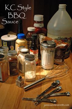 there are many different types of cooking utensils on the table with sauces