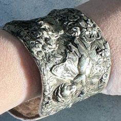 Thanks For Looking At This Handmade One Of A Kind Cuff Bracelet Made With Antique Sterling Silver From Gorham, Circa 1888 I Preserved This Stunning Antique From Destruction In History, Upcycled, And Soldered The Cracks, So Be Gentle, Its Not So Adjustable, So Don't Squeeze The Silver , If You Need Me To Adjust It , I Can Prior To Shipping + Fits Wrist 7-75 Inch Wrist Pictured 6.5" Solid Sterling Silver 925 Rare Antique That Is Repurposed To Make This Unique Cuff 2.75 Inches Wide 89.8 Grams Heavy Elegant Hand-cast Cuff Jewelry, Ornate Silver Cuff Bracelet, Elegant Hand Cast Silver Bracelets, Elegant Silver Hand Cast Bracelets, Silver Hallmarked Cuff Bracelet, Elegant Stamped 925 Cuff Bracelet, Silver 925 Stamped Cuff Bracelet As A Gift, Wedding Hallmarked Cuff Bracelet, Silver Collectible Bracelets