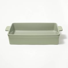 a green rectangular dish on a white background