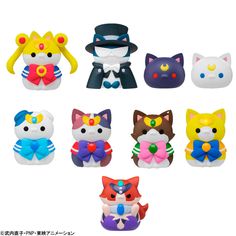 a bunch of small toys that are in the shape of people's heads and cats