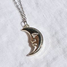 This necklace consists of a vintage puffy moon charm made in USA in the 1980s. Gold Edition: The 15x28mm charm is attached to a 18k gold plated 16” rolo chain. Silver Edition: The 15x28mm charm is attached to a silver plated 16" rolo chain. Vintage Moon, Moon Pendant Necklace, Chain Silver, Moon Charm, Rolo Chain, The 1980s, Moon Pendant, Moon Necklace, Cute Jewelry