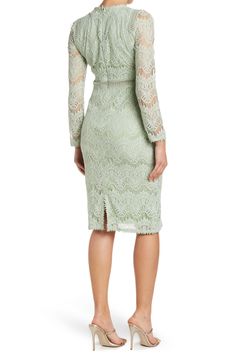 Chic lace constructs this adorable long sleeves dress, a perfect pick for your next soiree. 42" length (size S) Crewneck Long lace sleeves Sheer lattice waist panel Lined Self/lining: 100% polyester Machine wash Imported Model's stats for sizing: - Height: 5'9" - Bust: 34" - Waist: 23" - Hips: 35" Model is wearing size S. Fall Wedding Lace Midi Dress, Spring Dresses With Delicate Lace And Long Sleeves, Long Sleeve Lace Dress With Lace Trim For Evening, Spring Fitted Lace Dress With Lace Cuffs, Spring Elegant Lace Dress With Lace Cuffs, Elegant Spring Lace Dress With Lace Cuffs, Elegant Long Sleeve Dress With Scalloped Lace, Long Sleeve Lace Trim Evening Dress, Elegant Long Sleeve Scalloped Lace Dresses