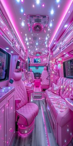 the interior of a limo with pink leather seats and purple lights on the ceiling,