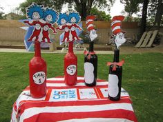 dr seuss and the cat in the hat themed birthday party with wine bottle centerpieces