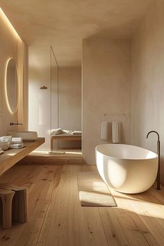 a large white bath tub sitting inside of a bathroom