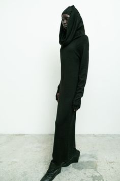 100% alpaca/ long tube dress/ oversized collar/ can be worn with collar off shoulder, as a cowl drape or a hood/ thumbholes Amam is 5'9" size 2 wearing size S Hooded Maxi Dress, Banana Fashion, Long Tube Dress, Cyberpunk Techwear, Dress With Hood, Futuristic Cyberpunk, Slouch Pants, Long Fitted Dresses, Fisherman Pants