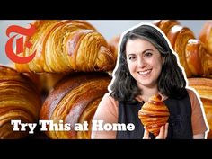 a woman standing in front of stacks of croissants with the words try this at home