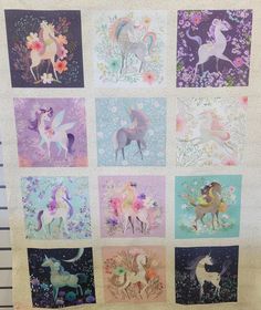 a quilt made to look like unicorns and flowers