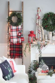 a living room filled with furniture and christmas decorations