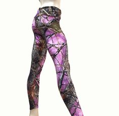 "SXYFITNESS Yoga Pants are available in a capri or legging style. The Hot Yoga Pants are available in two fit options : Low Rise, or High Waist/ Fold Over. These Printed Leggins are functional, with a great fit! Bend and stretch in style FABRIC: High Quality Performance Knit, breathable, 4 way stretch, medium weight lycra. STYLE: Low Rise * XXS/XS: (00-0 US) 8\" rise, 21\" inseam capri, legging 29\" inseam * XS/S: (0-2 US) 8.5\" rise, 21\" inseam, legging 29\" inseam * S/M: (4-6 US) 9.5 \" rise, Fitted Camouflage Bottoms For Outdoor, Pink Stretch Activewear For Outdoor, Fitted Camouflage Workout Bottoms, Pink Stretch Bottoms For Outdoor, Fitted Camouflage Leggings For Sports, Camouflage Fitted Bottoms For Athleisure, Fitted Moisture-wicking Capris For Gym, Camouflage Fitted Activewear For Gym, Camo Bridesmaid Dresses