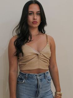 The answer to what to wear this weekend is here. The Twisted Chain Crop features a faux leather bodice with a twisted center detail, gold metal chain straps and exposed back zipper. Cropped 50% PU | 50% Polyester Minimal stretch Also available in Black Care: Hand wash SIZE LENGTH BUST WAIST SMALL 15.25" 28" 26" MEDIUM 15.5" 30" 28" LARGE 16" 32" 30" Leather Outfits For Women, Outfit Party Casual, Leather Crop Top Outfit, Leather Bodice, Girls Night Out Outfits, Trendy Christmas Outfits, Leather Crop Top, Neutral Tops, Twisted Chain