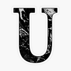 the letter u is made up of black and white marble sticker on a white background