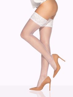 Perfection from top to toe, ISABELLA is the flagship model of the VienneMilano thigh high collection. Framed by a classic lace top that unfurls into a barely-there sheer, these are the thigh highs that will take you everywhere. Overtones of natural beauty and subtle sophistication are underpinned by luxury that will make any woman feel her best self. To bring out the best in your unique complexion, go Hazelnut for fair, Chestnut Brown for tan, and Chocolate Brown for dark! ISABELLA at a glance: Elegant Stretch Stockings With Lace Trim, Elegant Stretch Lace Trim Hosiery, Elegant Fitted Hosiery With Lace Trim, Elegant Stretch Legwear With Lace Trim, Elegant Stretch Lace Legwear, Elegant Lace Stretch Legwear, Lace Trim Hosiery, Elegant Stretch Legwear For Formal Occasions, Elegant Formal Stretch Legwear