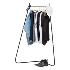 a rack with clothes and shoes hanging on it