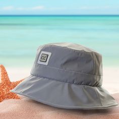 Looking for a hat that'll keep you dry, safe from the sun and looking amazing? Look no further than CC's Waterproof Reflective Bucket Hat! Stylish, lightweight and waterproof, this unisex hat will have you looking fly, no matter the activity or event. Plus, with adjustable inner band, a chin strap for secure fit and easy folding for travel, you'll be ready for anything! Don't forget, it's distributed by a family-owned USA business, and comes with Truly Contagious Support and CC branding & qualit Waterproof Solid Color Sun Hat For Outdoor, Waterproof Sun Hat For Outdoor, Casual Waterproof Sun Hat For Travel, Casual Waterproof Bucket Hat For Travel, Waterproof Nylon Bucket Hat For Travel, Solid Waterproof Bucket Hat, Waterproof Outdoor Bucket Hat, Waterproof Solid Color Bucket Hat For Outdoor, Waterproof Bucket Hat With Short Brim For Outdoor Activities