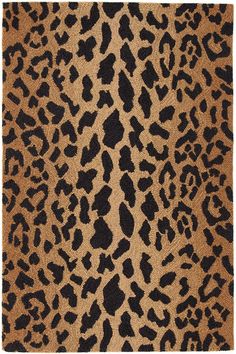 an animal print background with black spots