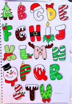 an open notebook with christmas stickers on it