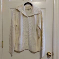 New St John's Bay Women's Ivory Cardigan Sweater Button Down Size Xl New Never Used Acrylic Long Sleeve Ivory Button Closure Machine Wash Collar Soft Knit Xl Tag Attached P To P 24" 25"L Items Sold Are Vintage/Antique/Pre Owned, Usually Showing Some Aged Wear, More Than Others. I Will List Any Flaws Or Damage That I Notice With Visual Images To Help. Please Study Photos And Note That Colours Can Vary By Screen Monitor. Item Are As Is. 2 Lb 1222 D Cream Button-up Winter Sweater, White Cable Knit Button-up Outerwear, Cream Sweater With Button Closure For Winter, Cream Sweater Coat With Buttons, Winter Cream Cardigan With Button Closure, White Winter Cardigan With Button Closure, Classic White Sweater With Buttons, White Winter Sweater With Button Closure, White Buttoned Sweater For Winter