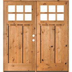 three wooden doors with windows on each side